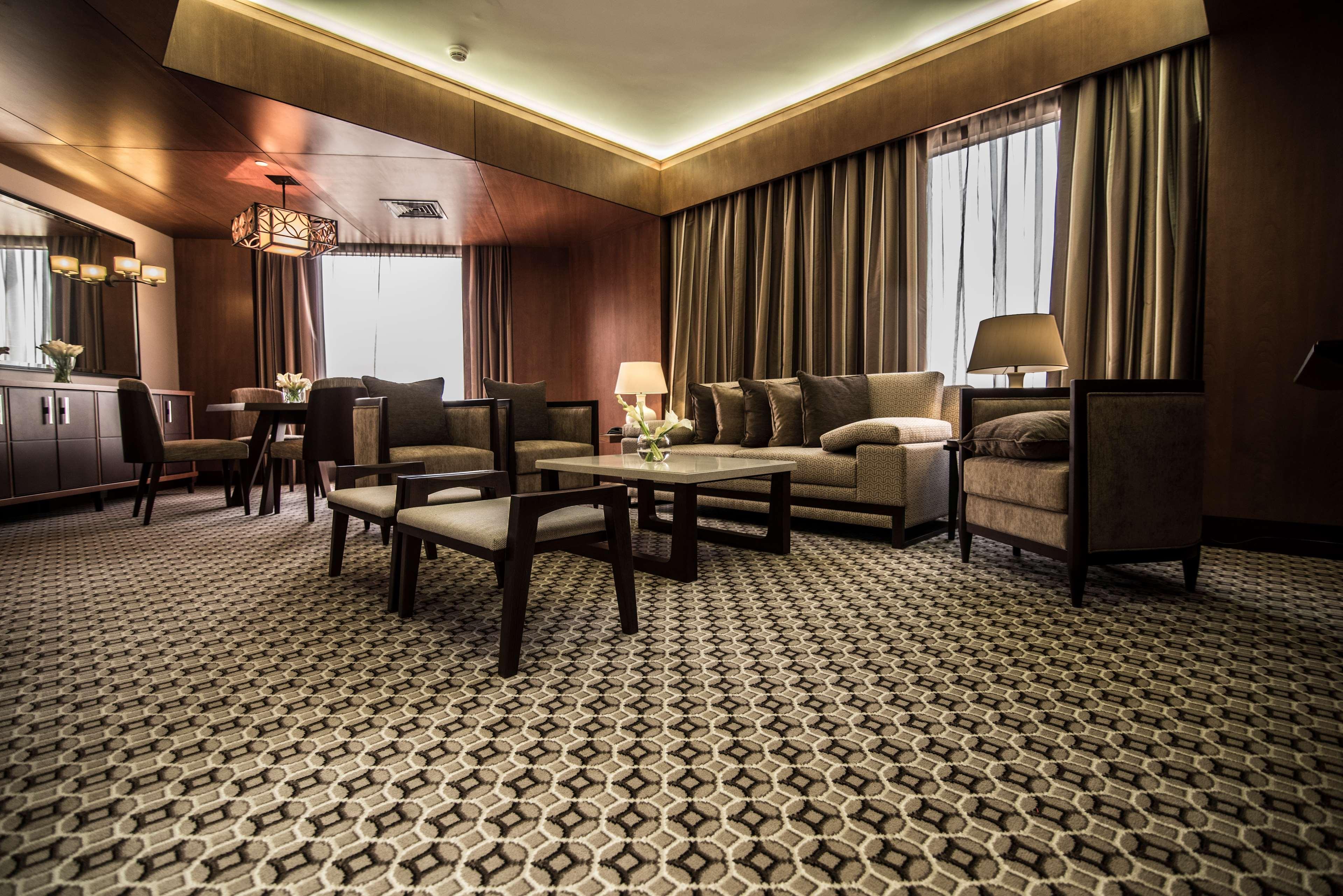 Ayla Grand Hotel Al-Ajn Zewnętrze zdjęcie A carpet in a hotel